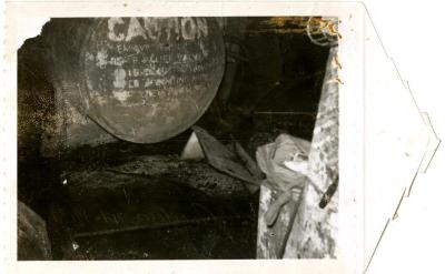 Aft End of Tank - Steel Plate, Dislocated Valve, and Hi-Hat Container