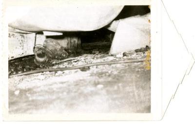 Aft End of Tank - Dislocated Valve and Steel Plate Underneath the Tank