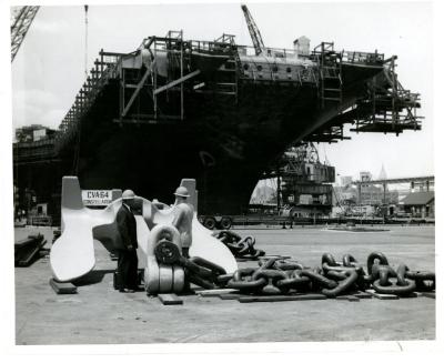 Mike DeLucia in Front of the USS Constellation (CV-64) During Construction at the Brooklyn Navy Yard