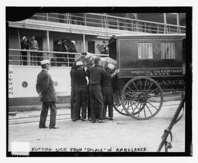 Putting sick from the USS Solace (AH-2) in a Navy Ambulance