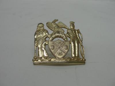 Metal embellishment for security uniform