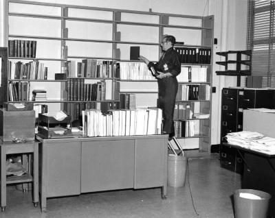 Louis Mauro working in the library